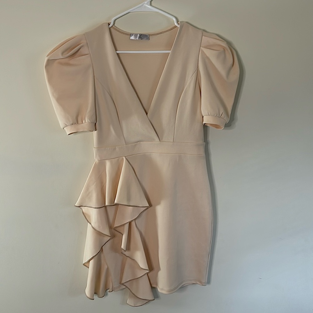 Beige colored with side ruffles